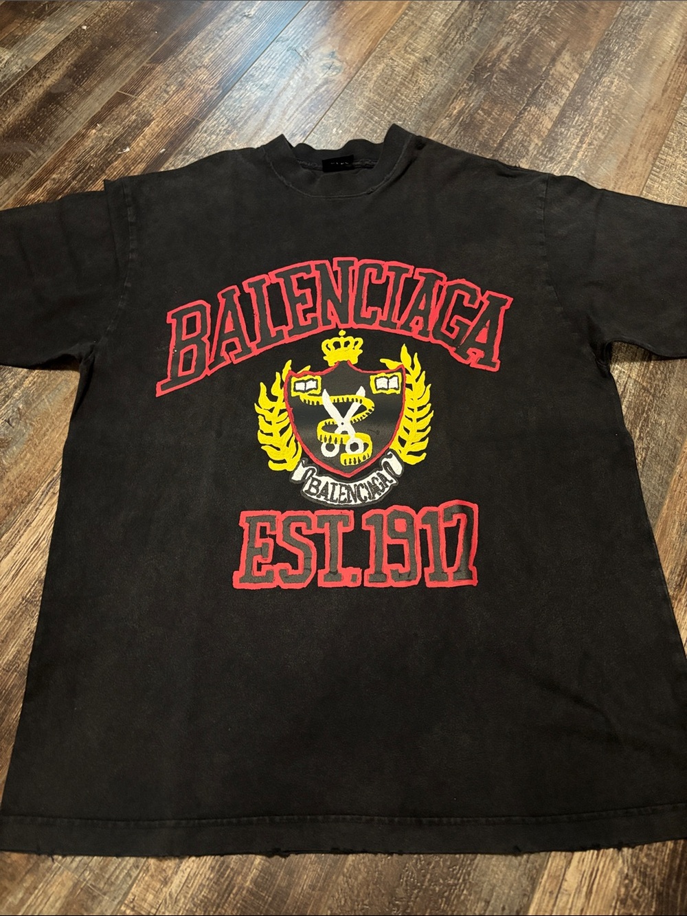 Balenciaga Black T-Shirt with Red and Yellow Crest Graphic